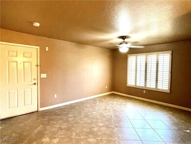 Family room with tiled flooring and open floorplan