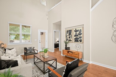 Living area featuring light wood finished floors,
