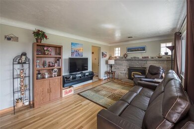 RELAX WITH THE FIREPLACE IN THE 18X11 LIVING ROOM.