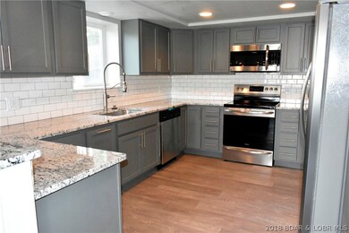 Incredible modern kitchen with custom cabinets and