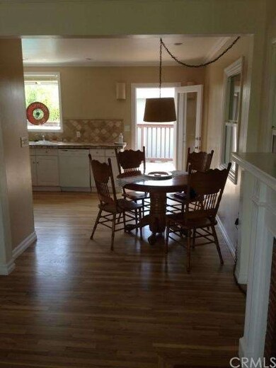 dining area open to kitchen and living room