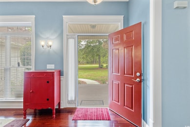 Entryway with plenty of natural light and wood fin