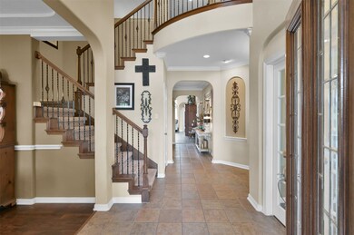 Foyer view showing the staircase to upstairs