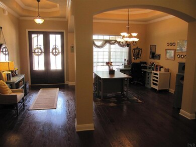 trey ceilings with crown molding.