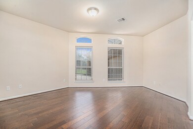 This additional formal living room provides the pe