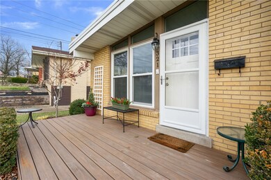This is a view of the front porch and a trex deck.