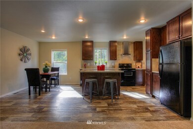 Plenty of room to gather in this spacious kitchen, the 