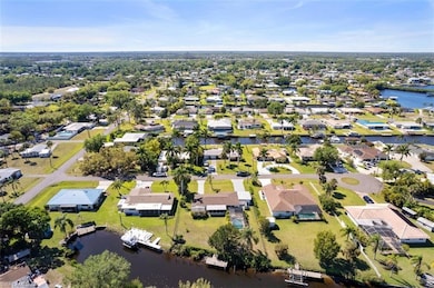 Aerial overview of property's location featuring nearby suburban area and a nearby body of water