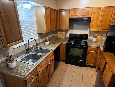Kitchen is virtually staged.