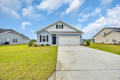 View of front of home with central AC, concrete dr