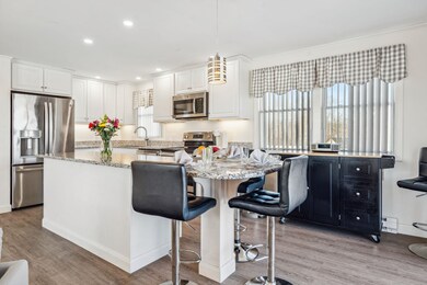 Updated kitchen with island seating.