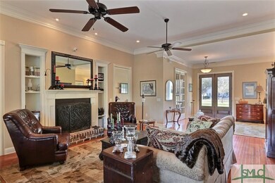 Family room with 11 foot ceiling, two ceiling fans