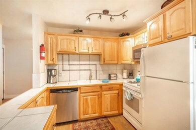 Updated Kitchen equipped with full refrigerator, g