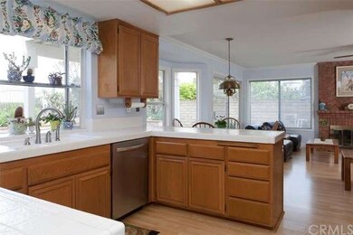 Spacious kitchen has charming garden window, plent