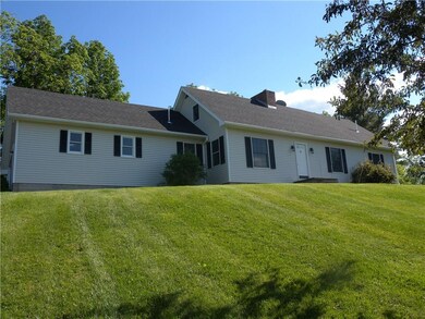 Another view of the front of the home. The vinyl s