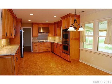 Exterior Front - Kitchen with new cabinetry and gr