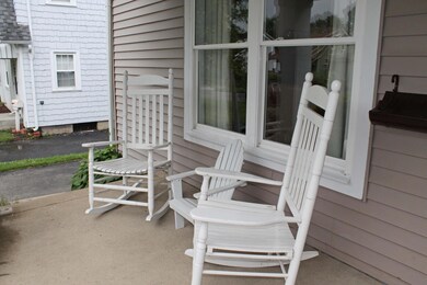 Covered front porch, nice landscaping