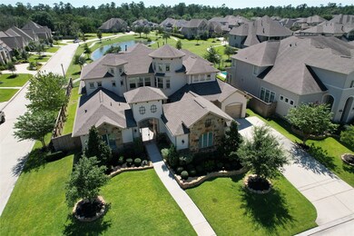 This incredible home sits on a corner lot with the best views of the community lake.