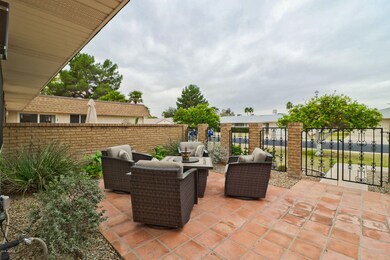 TILED AND GATED FRONT PATIO
