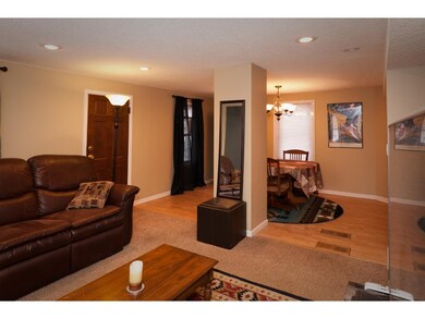 Living room and dining room flow nicely into each 