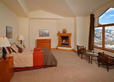 Spacious master bedroom with fireplace a