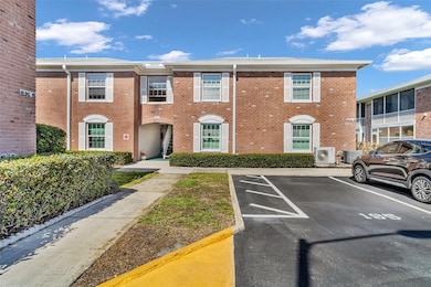 Front of building; unit on upper corner right