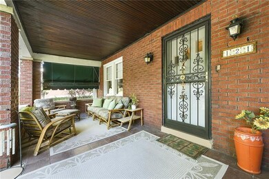 This HUGE 28x10 front porch can accommodate the en