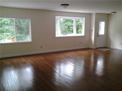 Living Room. HUGE LIVING ROOM WITH HARDWOOD FLOORS