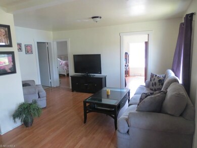 Look How Immaculate this Living Room is on the Upper Unit!! New Flooring