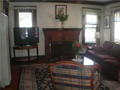 LIVINGROOM W/ HARDWOOD FLOORS - WOOD COVE CEILINGS