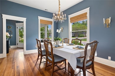 Two out of the five original hand blown windows which have been sealed for energy efficiency