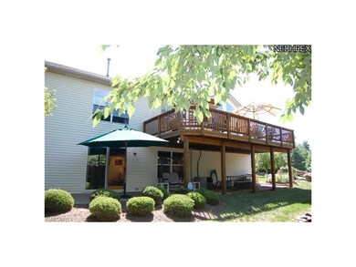 . . . and acts as covered porch to lower portion.