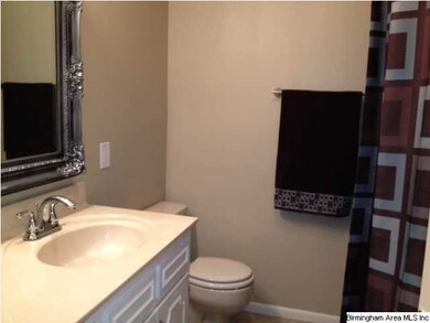 Hall bath has ceramic tile floors, tub/shower comb