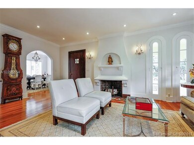 Living room has a working fireplace.