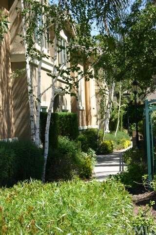 Side walk leads to front door. unit is on back sid