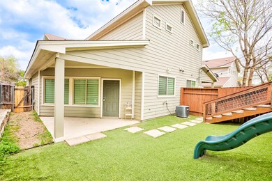 Rear view of property featuring a patio and cooli
