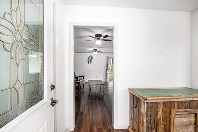 Entry with view of Living area and dining room