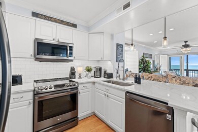 Kitchen with tasteful backsplash, visible vents, a