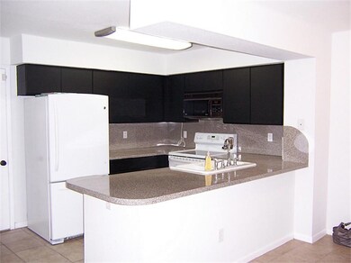 Contemporary style kitchen with eat in counter, ju