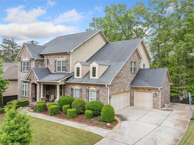 Exterior front: 3-car garage and large driveway