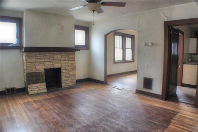 Large 15x12 Living room. Notice the wood work!