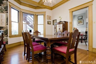 Formal Dining Room with bay window onto back yard 