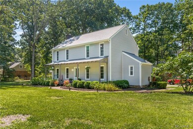 View of front of home featuring a front lawn