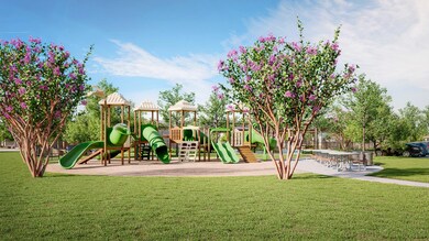 Community play area with a lawn