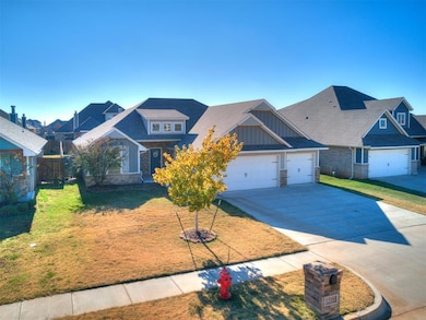 Craftsman-style home featuring a garage and a fron