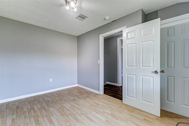 The secondary bedroom on the second floor is spaci