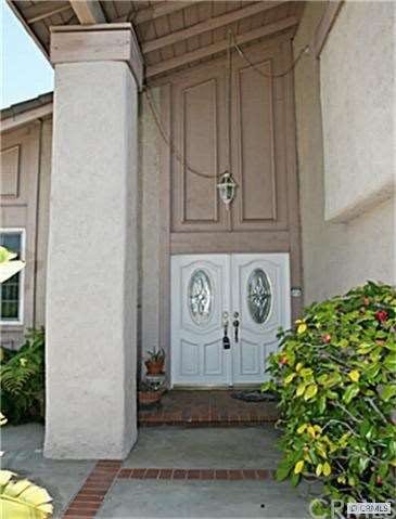 Majestic Entryway through Private Courtyard with C