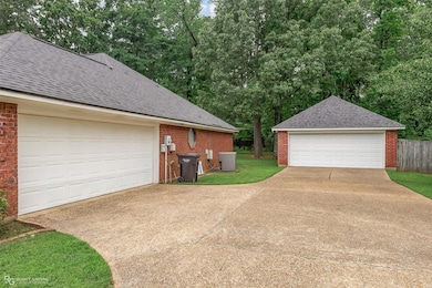 Two Car Side Entry Garage PLUS a Two Car Detached 