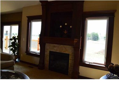 Living room with gas fireplace.