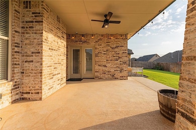 View of patio / terrace with ceiling fan